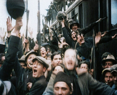 Italian Soldiers Standing on or Near a Train, Waving and Cheering, 1922. Creator: British Pathe Ltd.