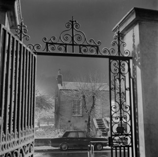 Detail of the wrought iron gate and overthrow at the Old Hall, Highgate, London, 1967; with the