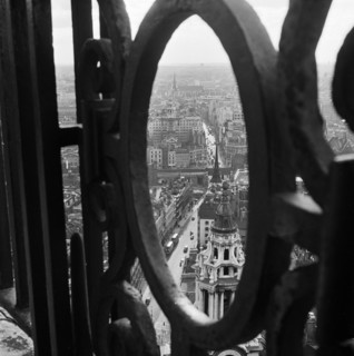 View through the decorative iron railings of the Golden Gallery at St Paul's Cathedral, looking