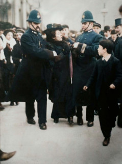 London - arrest of a suffragette, between c1910 and c1915. (Colorised black and white print).
