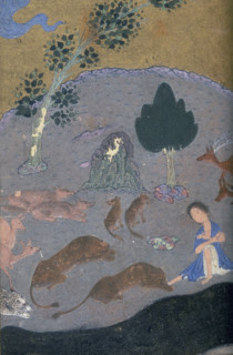 Majnun in the desert with the animals, c1410-c1411. Majnun sits in the desert surrounded by a stag,
