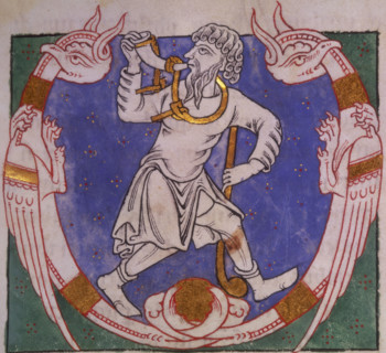 Amos, 1148. Beginning of the Book of Amos. Initial 'V', Amos blowing a horn, and carrying a club,