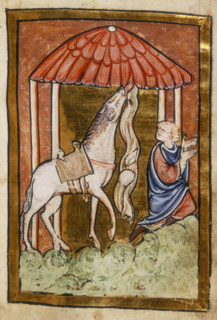 Cuthbert's horse pulls down bread and meat, last quarter of the 12th century. St Cuthbert's horse