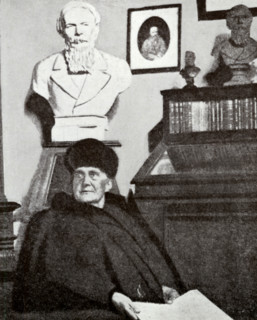 Mme Dostoevsky at work in the Dostoevsky room of the Moscow Historical Museum (taken during her