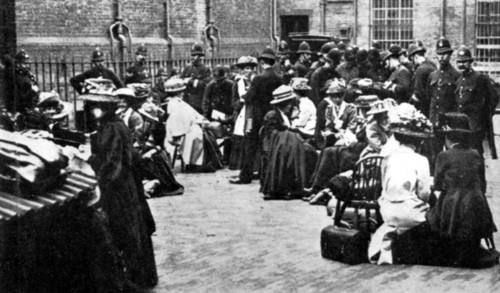 Awaiting their turn in the Police Yard at Bow Street, London, 30 June 1909. Suffragettes were