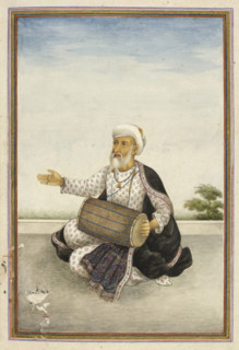 Kavval’, a sub-caste of the large Muslim caste of ‘Mirasis’ or singer/genealogists - A man beating
