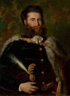 Portrait of Albert Ujházy, 1868. Bearded man wearing a fur-lined cloak with a gold jewelled clasp.