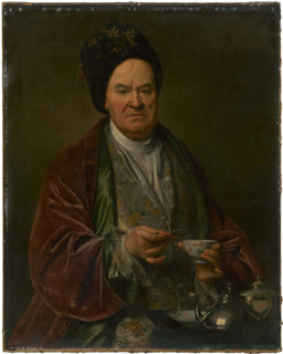 Portrait of a man, 1700-1730. Man wearing a velvet robe holding a teacup. Probably by Ján Kupecký.