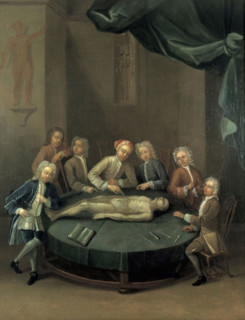 William Cheselden giving an anatomical demonstration to six spectators in the anatomy...1730s. Creator: Unknown.