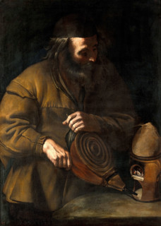 An alchemist applying bellows to a fire beneath a retort, 18th (?) century. Creator: Unknown.