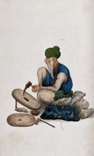 A man making grindstones, (between 1800 and 1899?). Creator: Unknown.