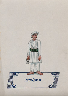 A servant standing on a carpet holding a bunch of keys, (between 1800 and 1899?). Creator: Unknown.