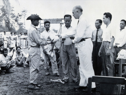 Fritz Ronnefeldt distributing medicine, c1940s. Creator: Unknown.
