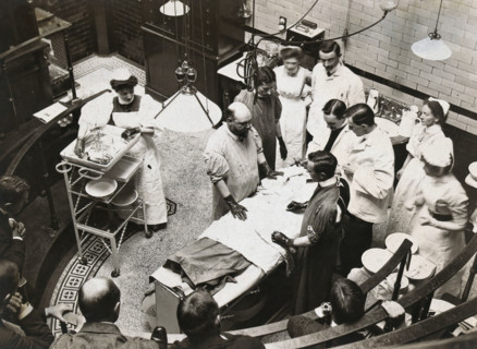 Charing Cross Hospital: Stanley Boyd in the old operating theatre, 1900. Creator: Unknown.