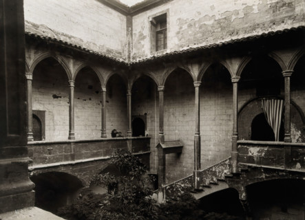 Hospital de la Santa María, Lérida: view of the staircase to the courtyard, c1900. Creator: Unknown.