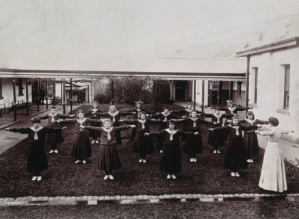 Metropolitan Lunatic Asylum, Kew, Victoria, Australia: female patients exercising, c1890s.. Creator: Unknown.