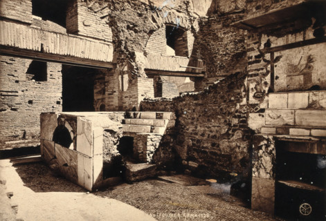 Partly ruined buildings in Ostia identified as a tavern or hot-food shop (thermopolium)..., 1928. Creator: Unknown.