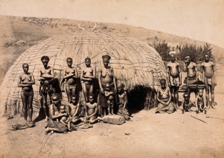 South Africa: Africans in front of a traditional kraal hut, between 1800 and 1899. Creator: Unknown.