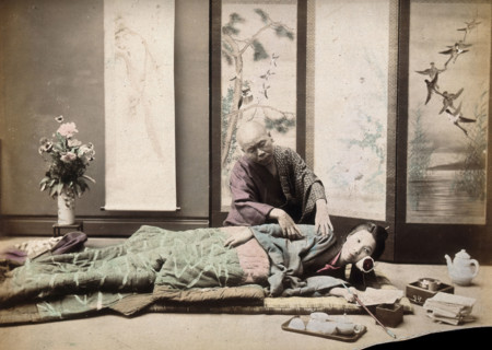 A Japanese woman being massaged by a blind Japanese masseur, c1890s. Creator: Unknown.