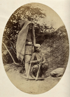 Nepal: two Tibetan men with pick-axes, c1860. Creator: Clarence Comyn Taylor.