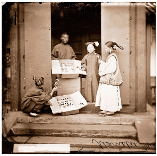 China: Manchu women buying flowers for their headdress, Beijing, 1869. Creator: John Thomson.