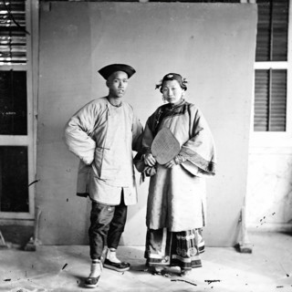 Amoy, Fukien province, China: a married couple, standing, 1870. Creator: John Thomson.