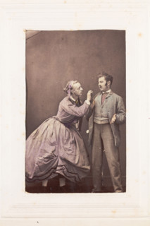 Two men, one in drag, posing in disagreement, [between 1890 and 1899?]. Creator: Unknown.