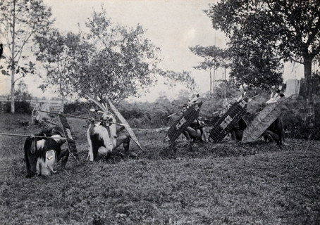 Sarawak: five Kenyah warriors in a warfare ritual, c1900. Creator: Unknown.