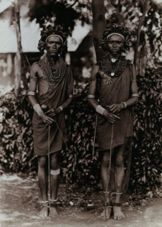Two young Kikuyu men, carrying sticks, c1900. Creator: Unknown.