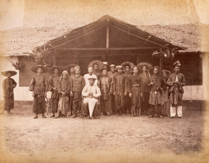 Malaya: Captain China surrounded by his Chinese and Malay followers, 1880. Creator: John Edmund Taylor.