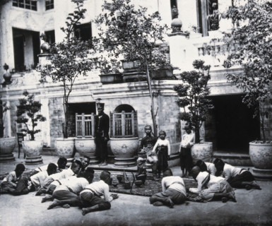 Prince Chulalongkorn of Siam (Thailand) (seated, centre), with Prince Bhanugrangsi..., 1866. Creator: John Thomson.