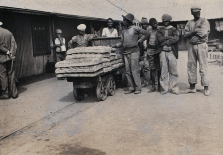 South Africa: bread carried on trolleys for the African workers at De Beers Mine, 1905. Creator: Hugh Marshall.