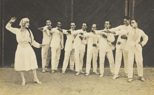 Actors, one in drag, performing on stage as "The Curios",  c1918-1920. Creator: Unknown.