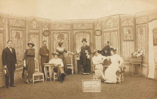 Prisoners of war, some in drag, posing on stage in 'Miquette et sa mere' at..., (1910-1919?). Creator: Unknown.