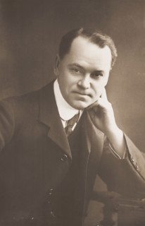 Malcolm Scott posing for a portrait, 1906. Creator: Unknown.