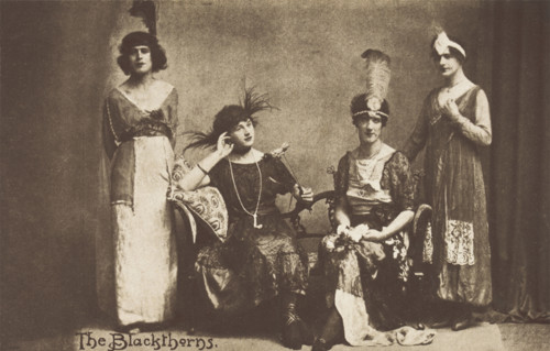 Amateur actors in drag, pose on stage as "The Blackthorns", (between 1910 and 1919?). Creator: Unknown.