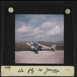 The Guernsey and Jersey Airways de Havilland D H 86 Express G-ACZP on a runway, perhaps at..., 1939. Creator: Norman Kingsley Harrison.