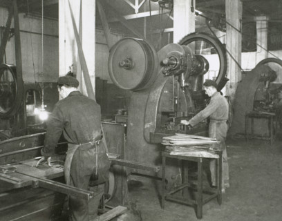 Production line of a company who manufacture motorcycle components, Barcelona, Spain, 1945.  Creator: Unknown.