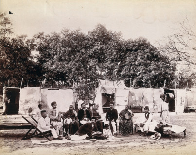 An affluent family forced to leave their home due to plague in their neighbourhood sitting...1896/7. Creator: Unknown.