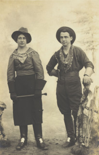British prisoners of war in cowboy and cowgirl costumes posing at...(1910 - 1919?). Creator: Paul Tharan.