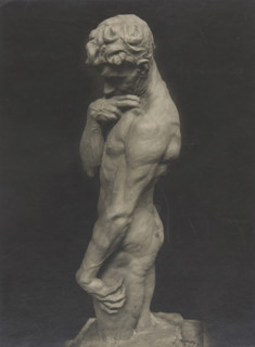 Male nude covering his chin with his right hand, 1920.  Creator: Unknown.