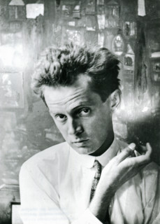 Egon Schiele in front of the painting "Waldandacht" (Forest prayers), 1915.