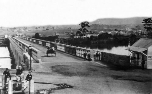 Crossing the first permanent Victoria Bridge, Brisbane, c1874. Creator: Unknown.