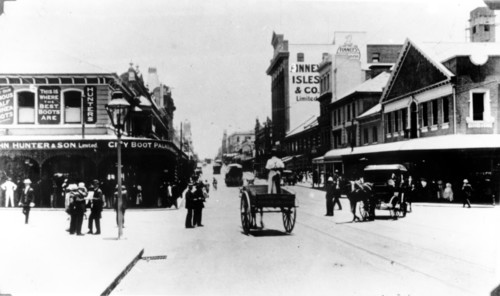 Policeman directs traffic at the intersection of Queen and Edward St, Brisbane, Queensland, c1908. Creator: Unknown.