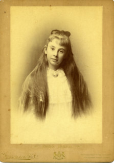 Portrait photography of an unknown teenage girl with beautiful long hair. Creator: Unknown.