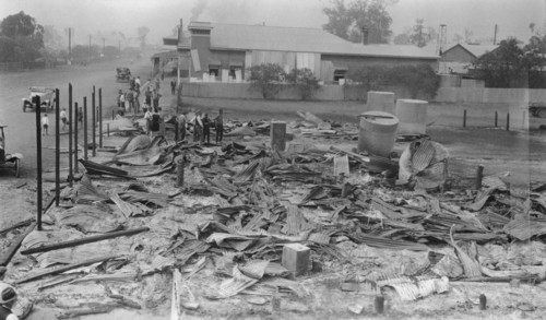 Main Street Fire Damage, Toogoolawah, Queensland, 1926. Creator: Jack Bain.