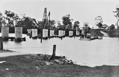 Coomera River Ferry and construction of the road bridge, 1929. Creator: Jack Bain.