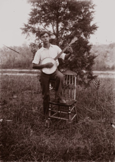 Untitled (man with banjo, neg, #1), c1931, printed c1975. Creator: Wendell Hotter.
