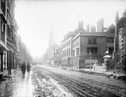 A view down the High Street with snow and slush in the road, Oxford, Oxfordshire, 1885. Creator: Henry Taunt.
