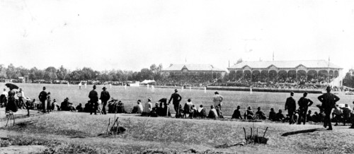 English cricketers in Australia: the Adelaide Cricket Oval (the English team in the field), 1895. Creator: Scott Barry.